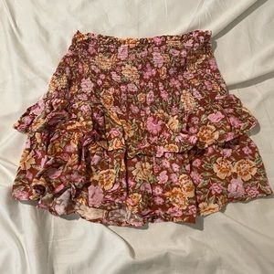 Mauve floral skirt sm/med. Stretchy waist band. Worn twice. Layered with ruffles